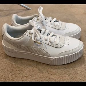 Puma white tennis shoes. Like new. Raised platform.